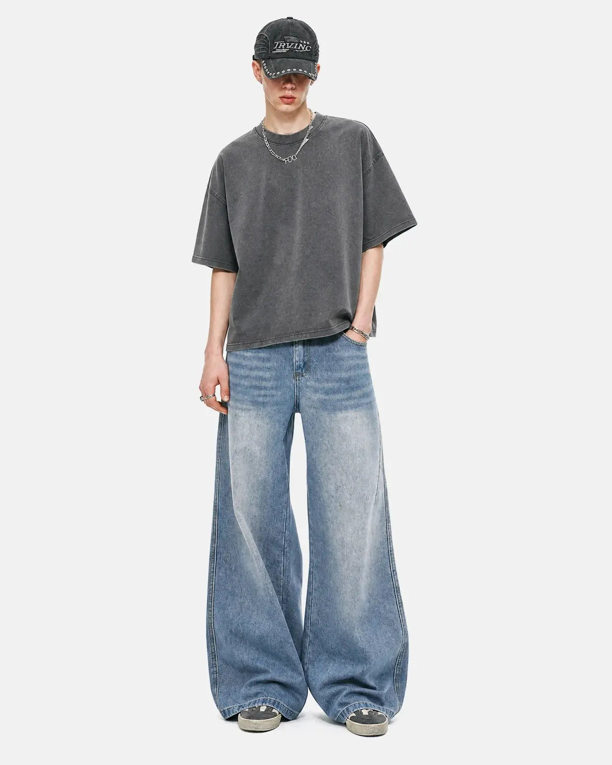 Inflation Star Pocket Bootcut Jeans featuring star-shaped pockets and classic bootcut style in denim fabric.