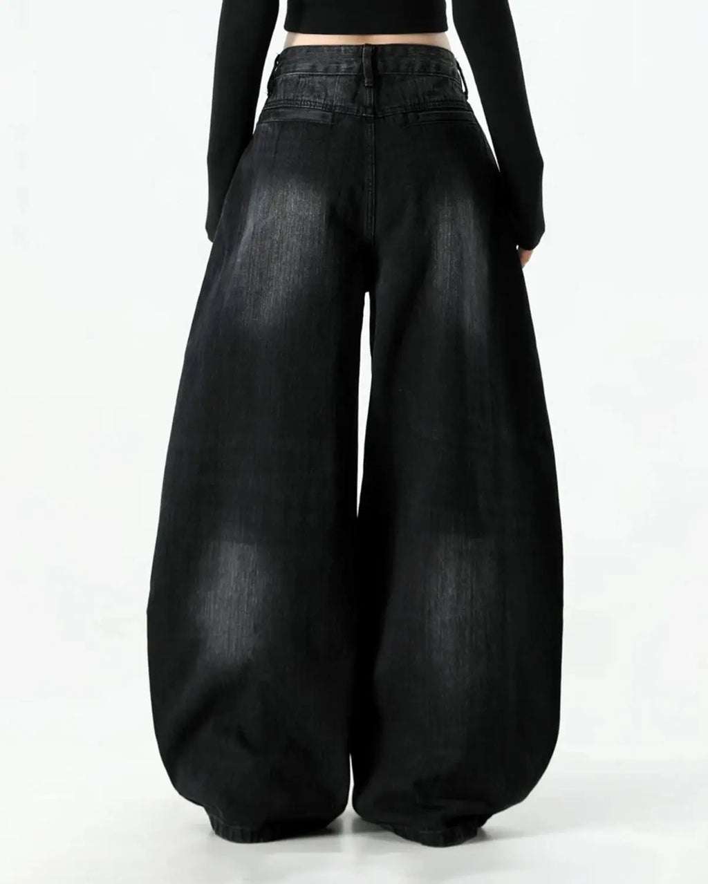 Inflation brand graphic embroidered washed barrel jeans, showcasing detailed embroidery and distressed denim style.