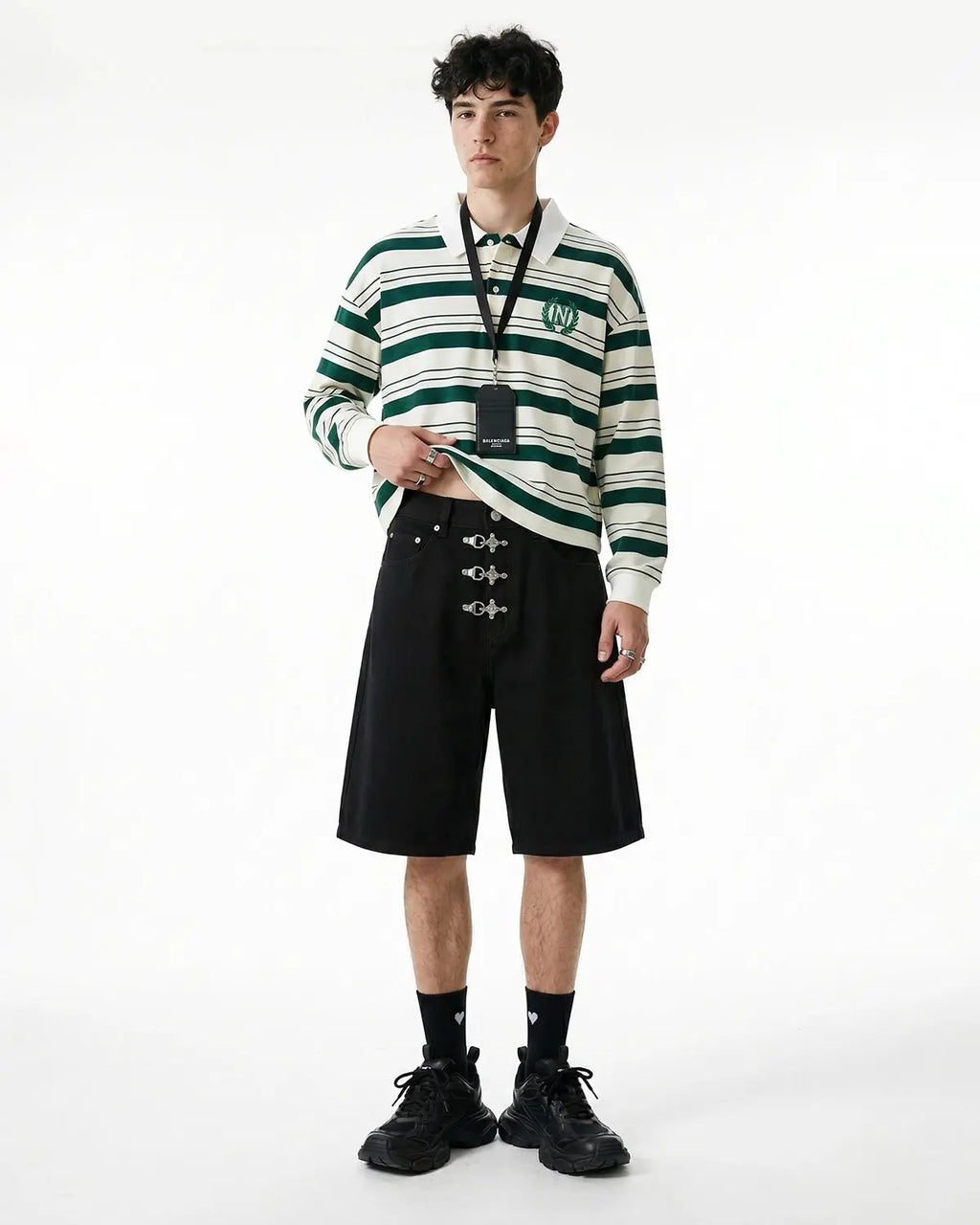 Metal clasp baggy jorts from INFLATION Streetwear featuring distressed denim, oversized fit, and metal hardware details.