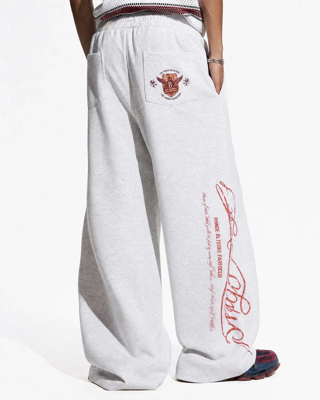 Vintage Washed Barrel Sweatpants by INFLATION, featuring relaxed fit, distressed denim look, and casual streetwear style.