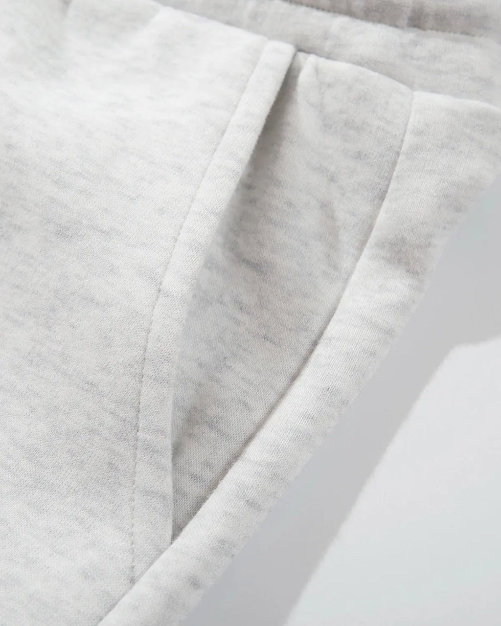 Inflation Streetwear layered waist baggy wide-leg sweatpants in light fabric, showing relaxed fit and stylish design.
