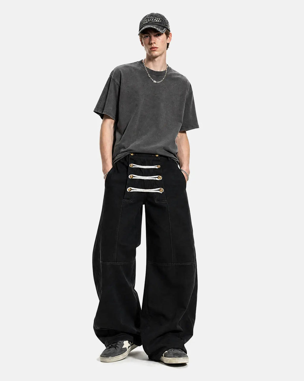 Inflation Streetwear braided rope barrel pants with unique braided design and tapered fit, shown in a close-up view.