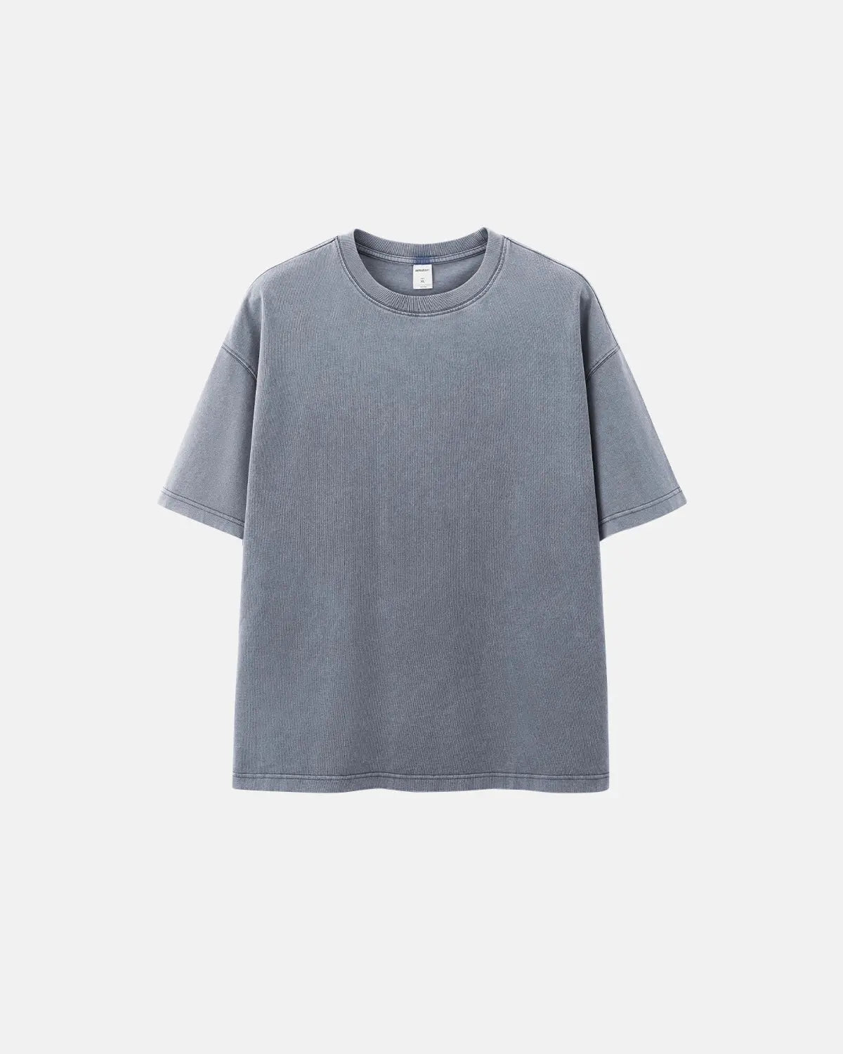 Inflation brand heavyweight oversized washed T-shirt with a relaxed fit and vintage wash, displayed on a plain background.