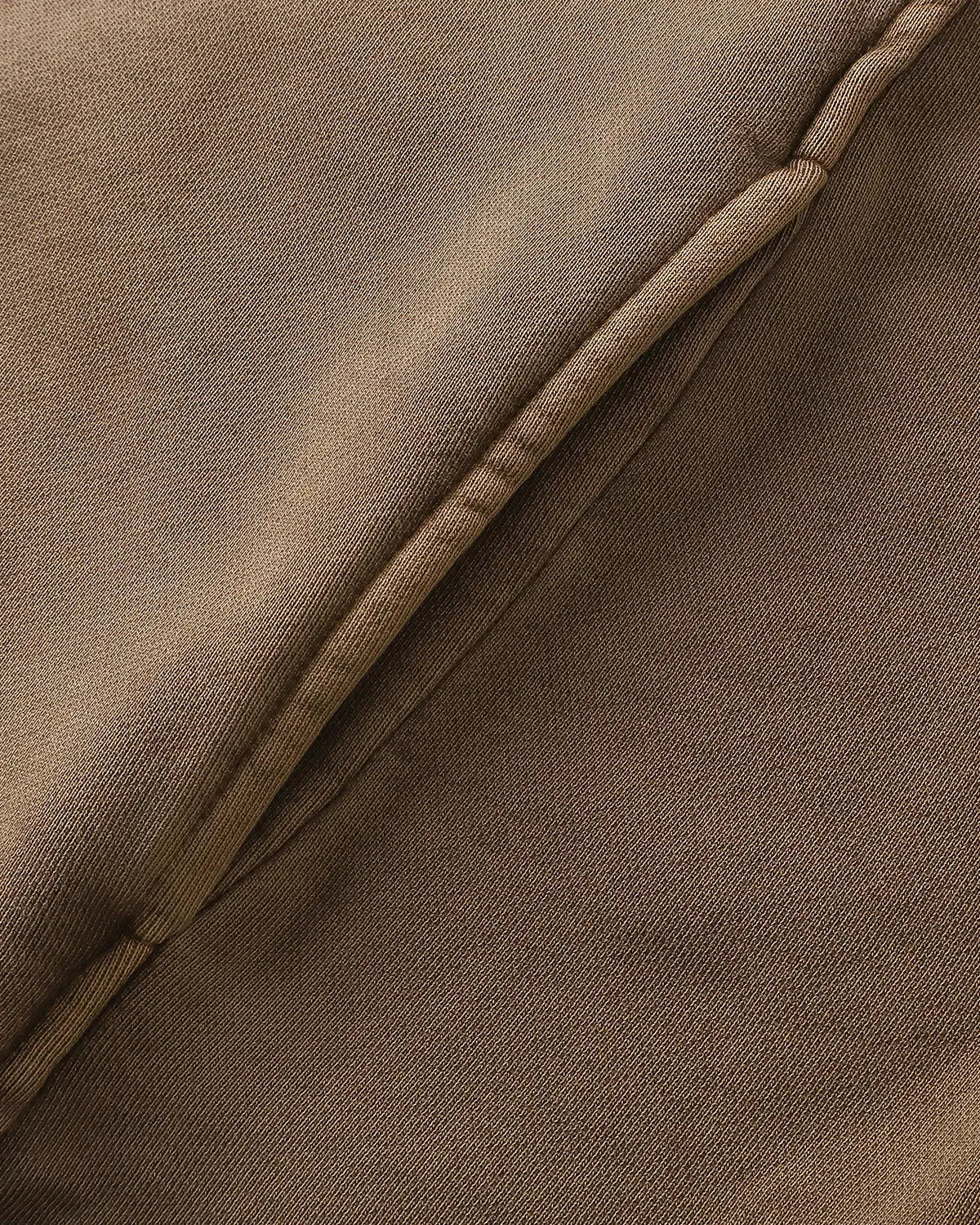 Inflation Streetwear acid wash zip-up hoodie with stitching details, casual fit, and front zipper, styled on a model.