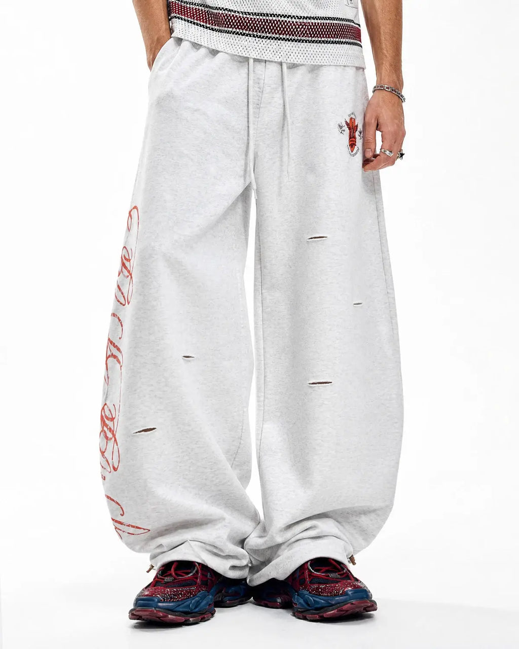 Vintage Washed Barrel Sweatpants by INFLATION Streetwear, showing relaxed fit, washed denim texture, and stylish design details.