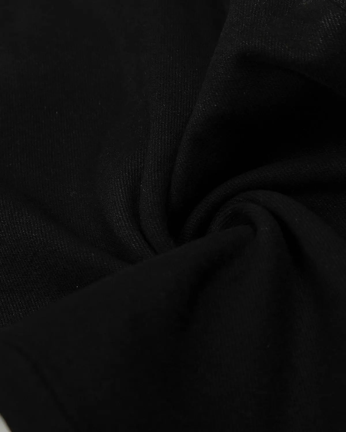 Black baggy jeans by INFLATION featuring a relaxed fit and streetwear style, shown on a model.