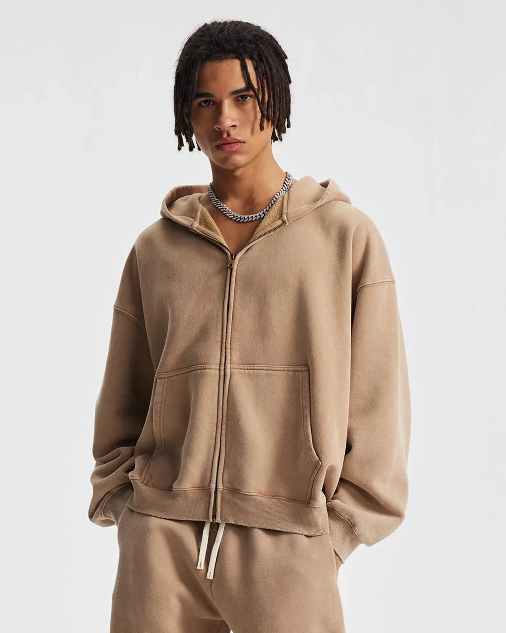 Inflation Streetwear boxy fit acid washed fleece zip-up hoodie with a relaxed fit and hood, shown in a close-up view.