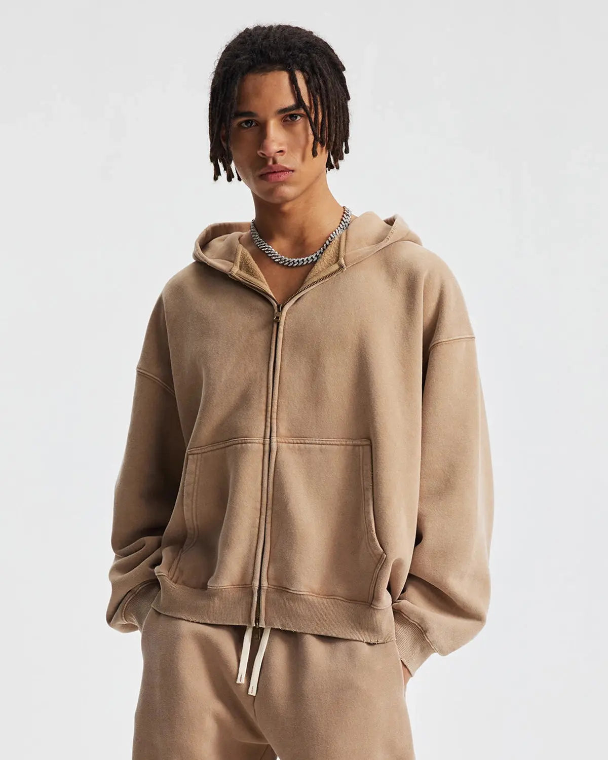 Inflation Streetwear boxy fit acid washed fleece zip-up hoodie with a relaxed fit and hood, shown in a close-up view.