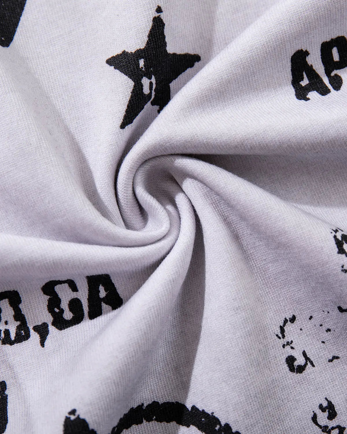 Rhinestone washed graphic T-shirt by INFLATION featuring bold design and distressed fabric in a streetwear style.