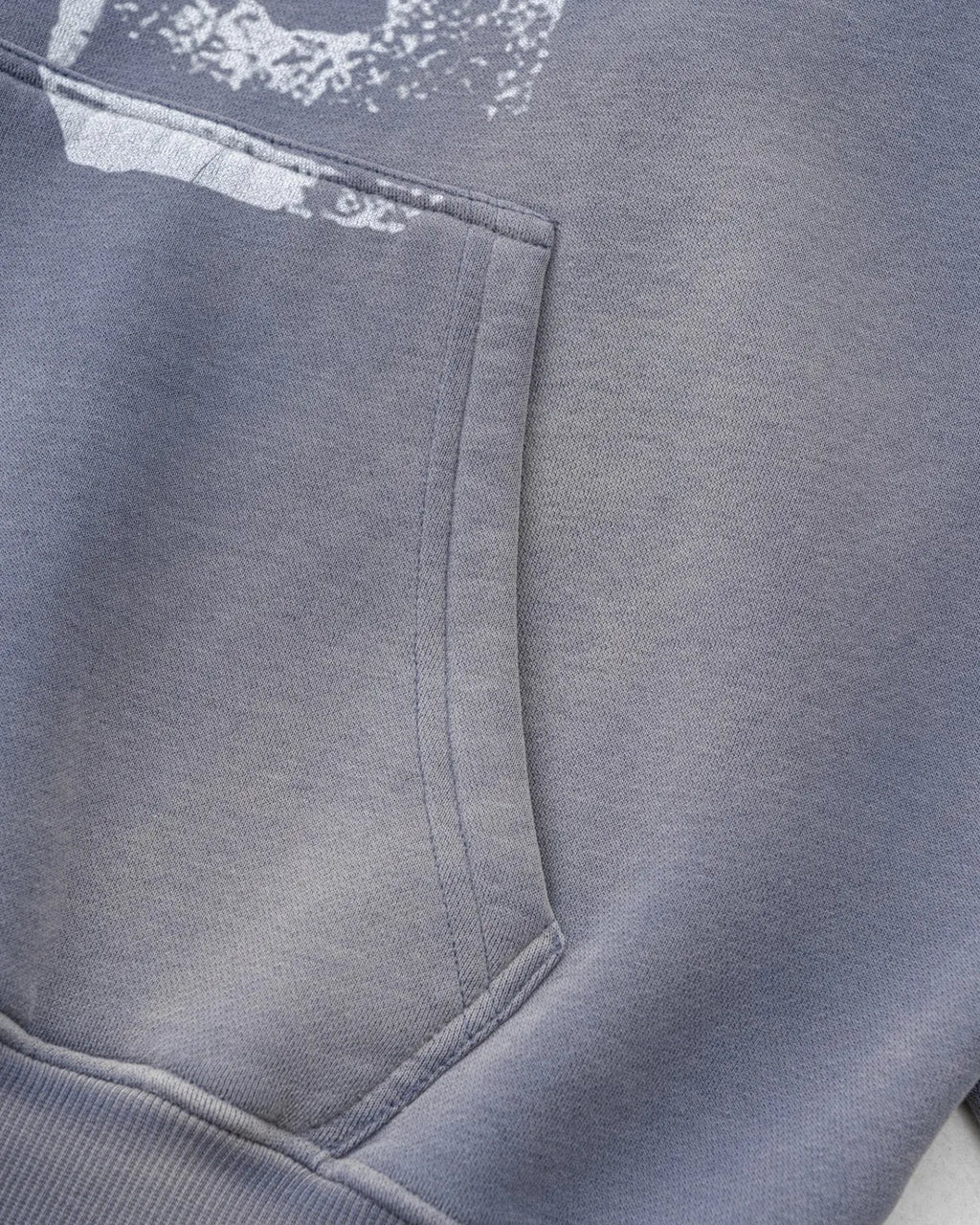 Inflation Streetwear graffiti print washed fleece hoodie with bold graffiti design and relaxed fit, casual streetwear style.