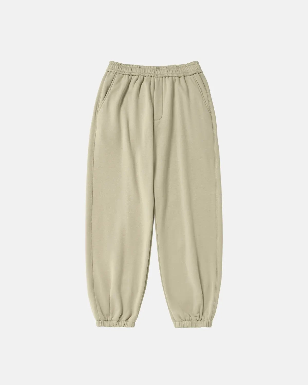 Relaxed fit cozy joggers by INFLATION featuring soft fabric and casual streetwear style, shown in a relaxed pose.