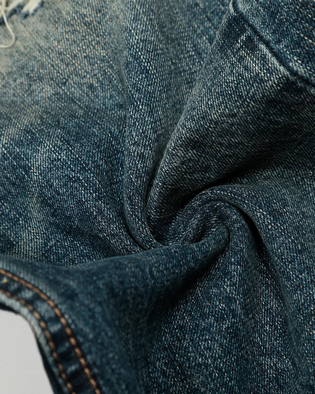 Vintage distressed baggy jeans by INFLATION featuring a relaxed fit and worn-in denim style.