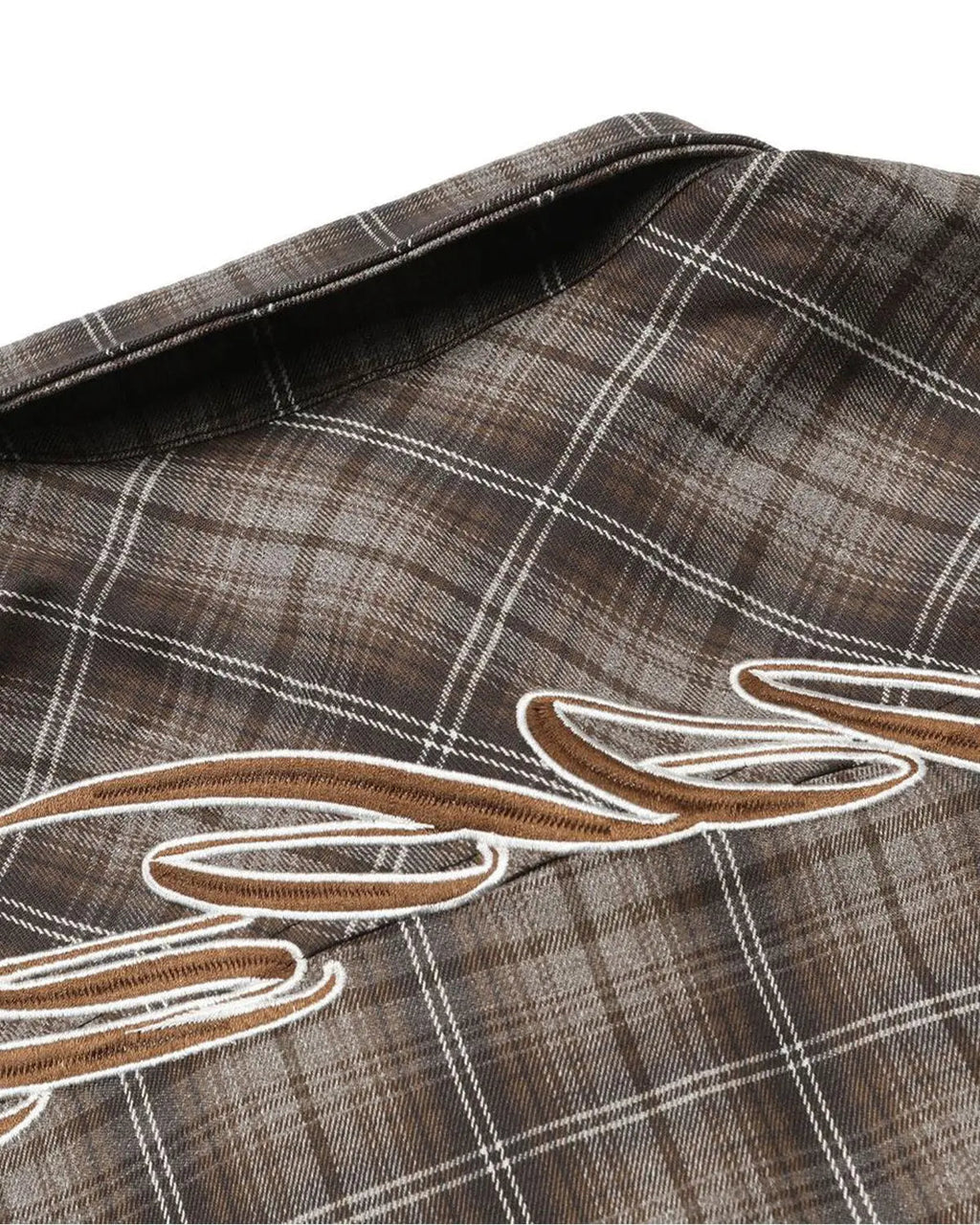 Inflation Streetwear plaid script embroidered shirt featuring a classic plaid pattern and embroidered logo on the chest.