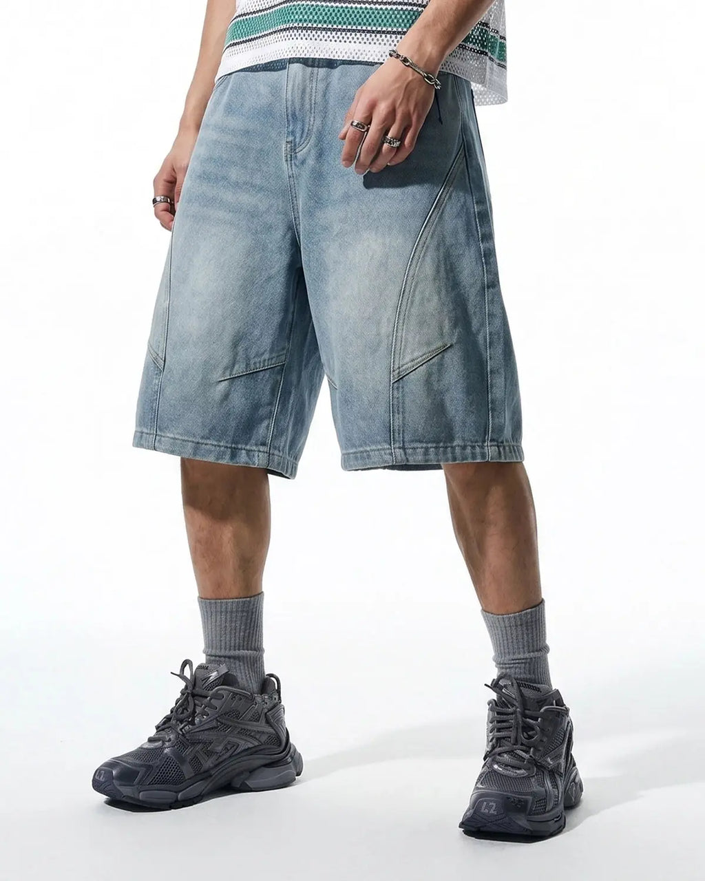 Pair of structured washed denim shorts by INFLATION Streetwear, showcasing a casual, relaxed fit with distressed details.