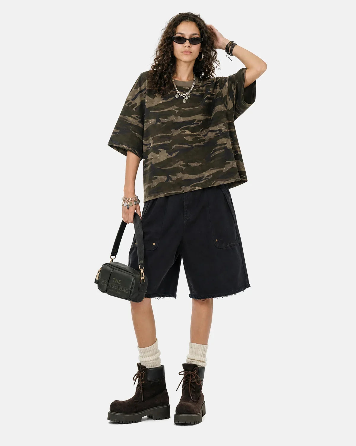 Inflation streetwear camo knee-length shorts with frayed hem, featuring a stylish military camouflage pattern and casual fit.