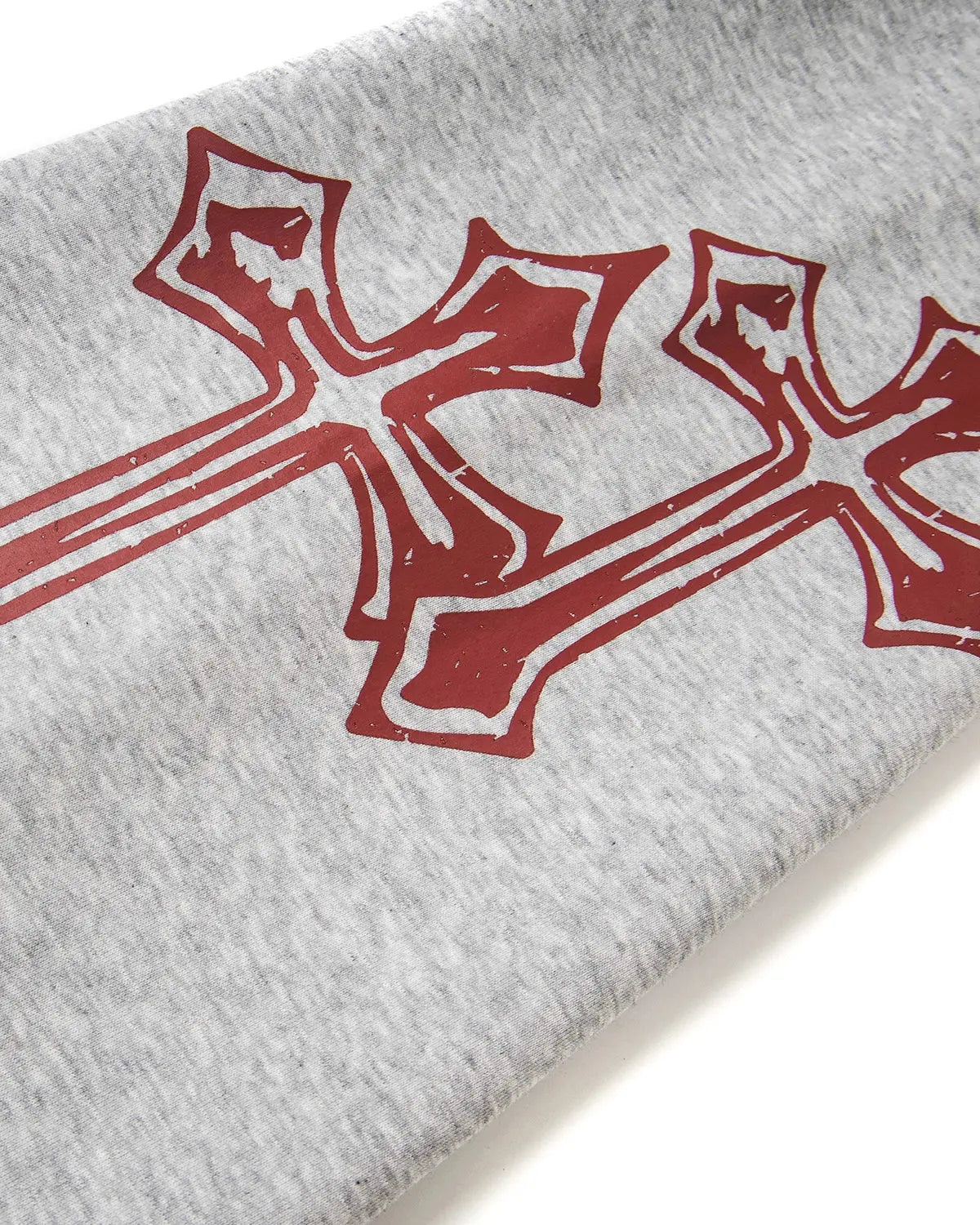 Inflation Cross Print Baggy Sweatpants in black with bold cross design, relaxed fit, and drawstring waist for streetwear style.