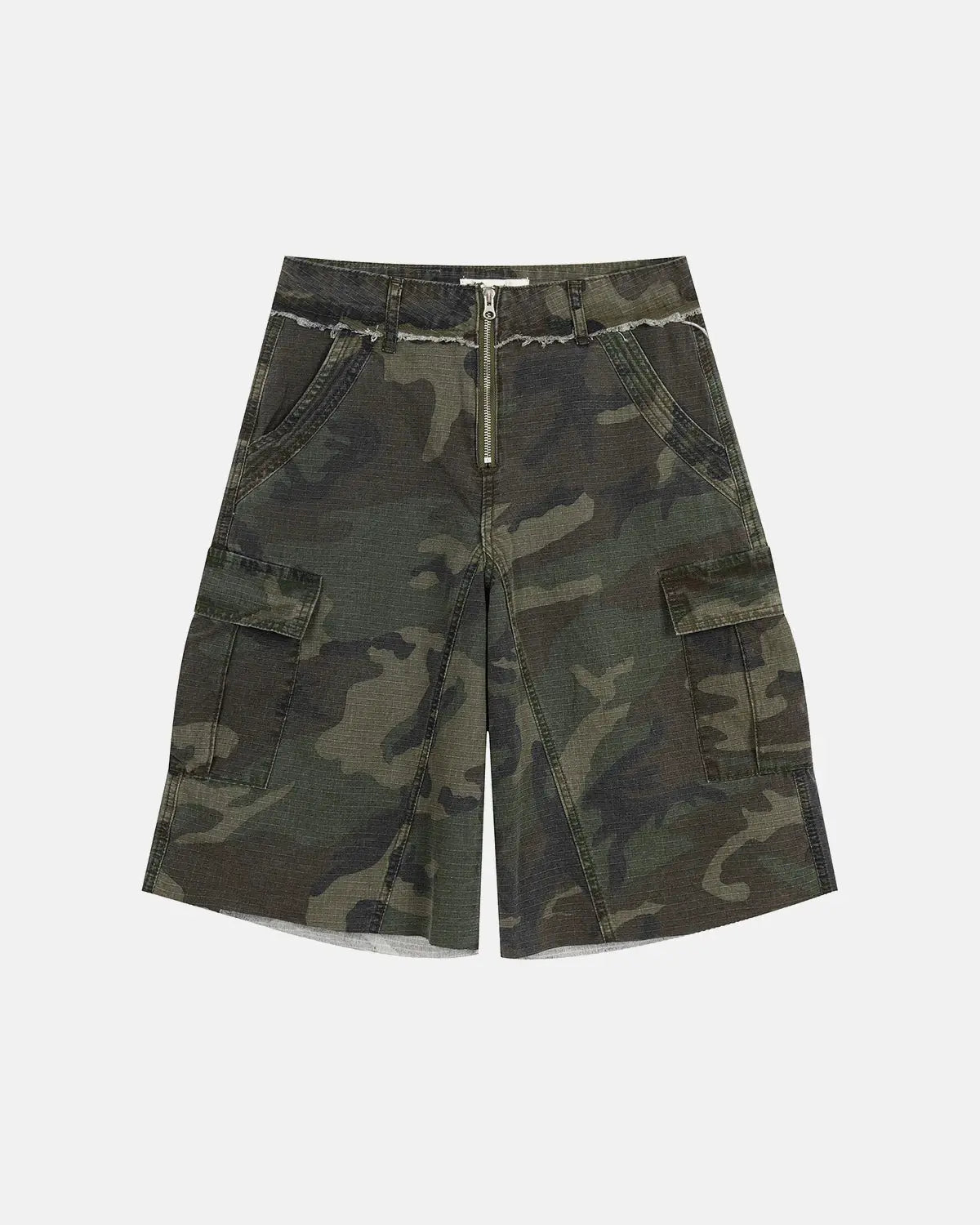 Camo utility longline shorts by INFLATION, featuring a camouflage pattern, multiple pockets, and a relaxed streetwear style.