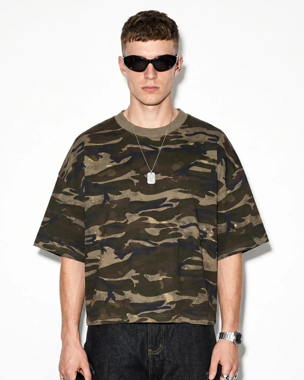 Boxy camo T-shirt by INFLATION featuring a loose fit and camouflage pattern, casual streetwear style.