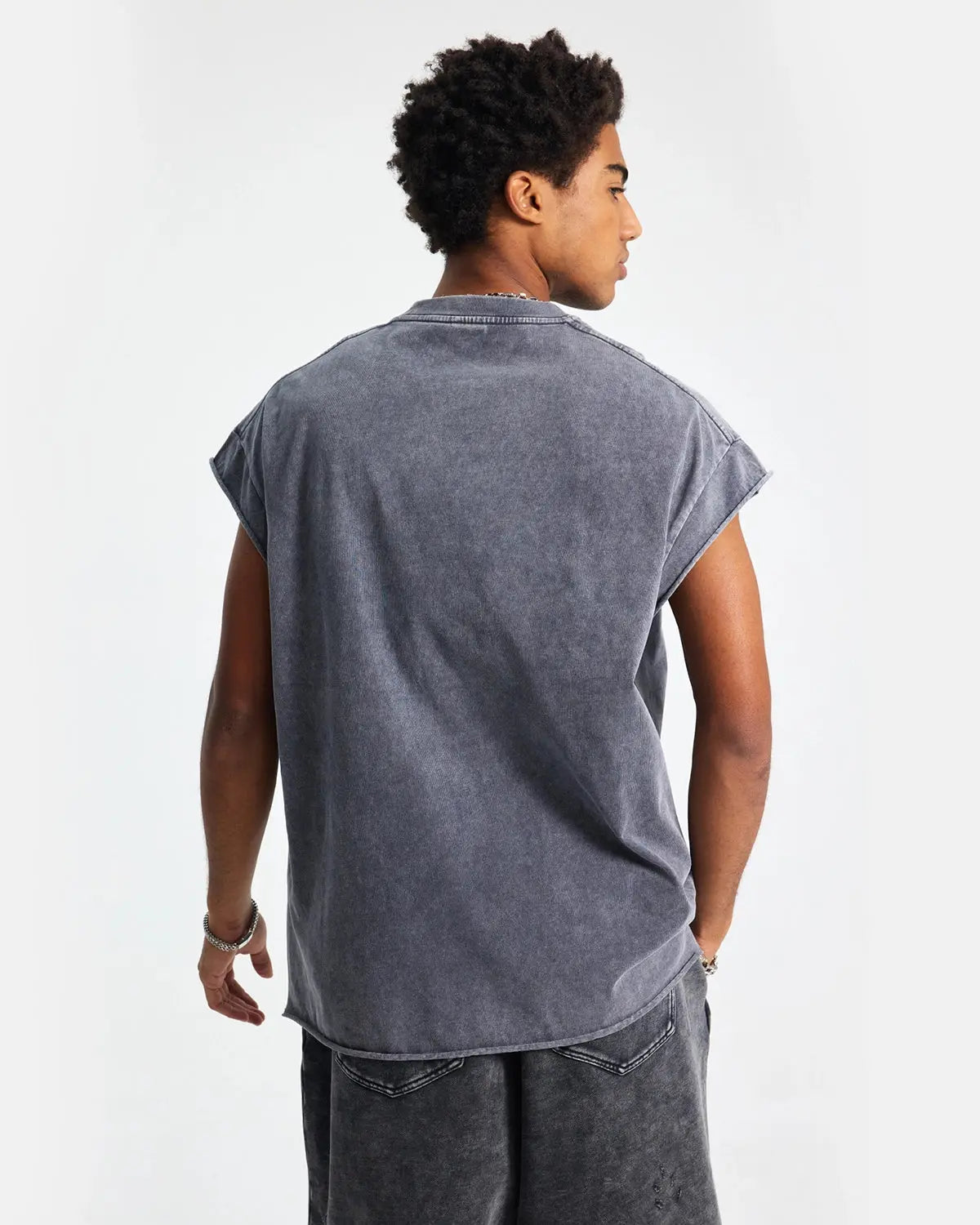 Inflation Streetwear distressed wash tank top featuring a faded, worn look with frayed edges and casual sleeveless style.