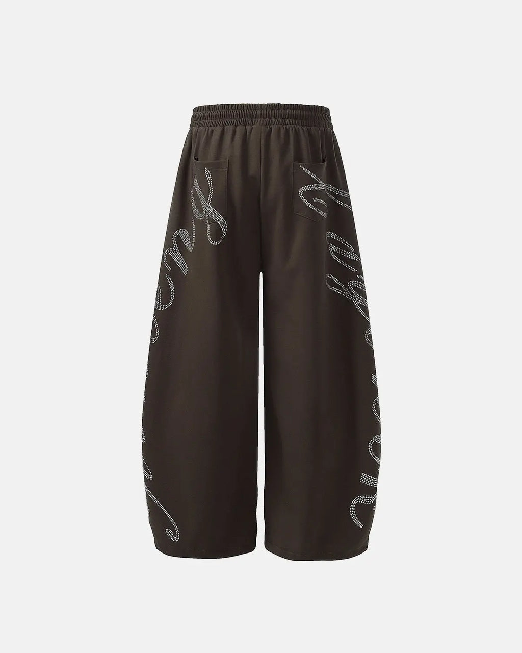 Shiny rhinestone baggy joggers from INFLATION streetwear collection showing a relaxed fit with sparkling rhinestone embellishments.