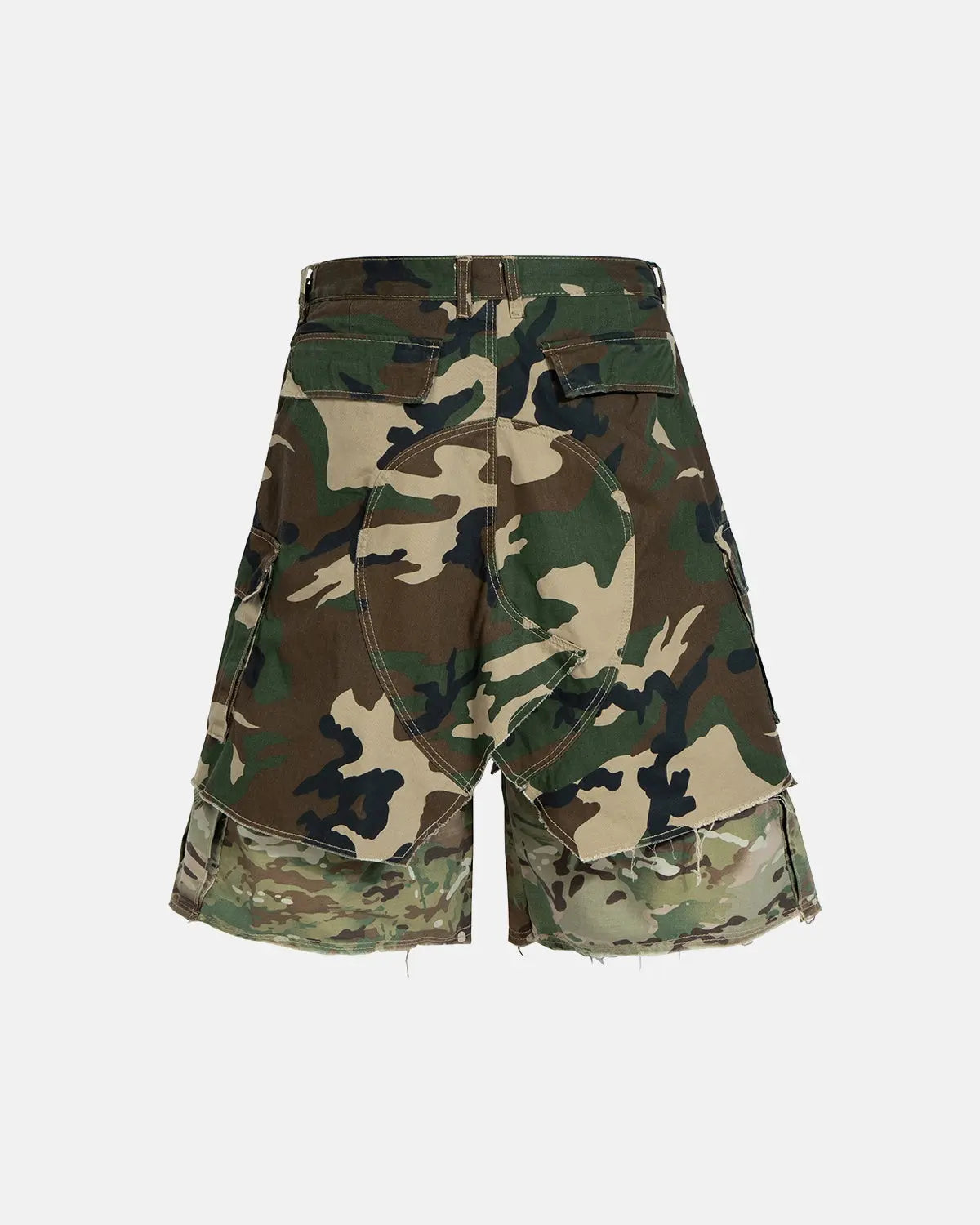 Camo layered longline jorts by INFLATION Streetwear shown on a model, featuring a relaxed fit and layered fabric design.