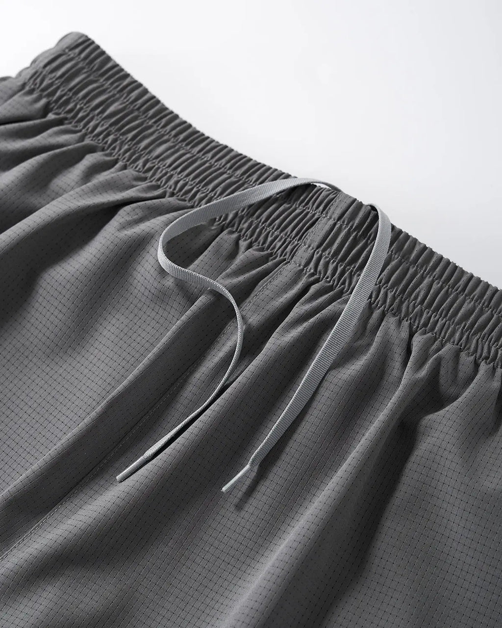 INFLATION AirFlow dual-layer breathable shorts pants with lightweight, ventilated design for comfort and airflow.