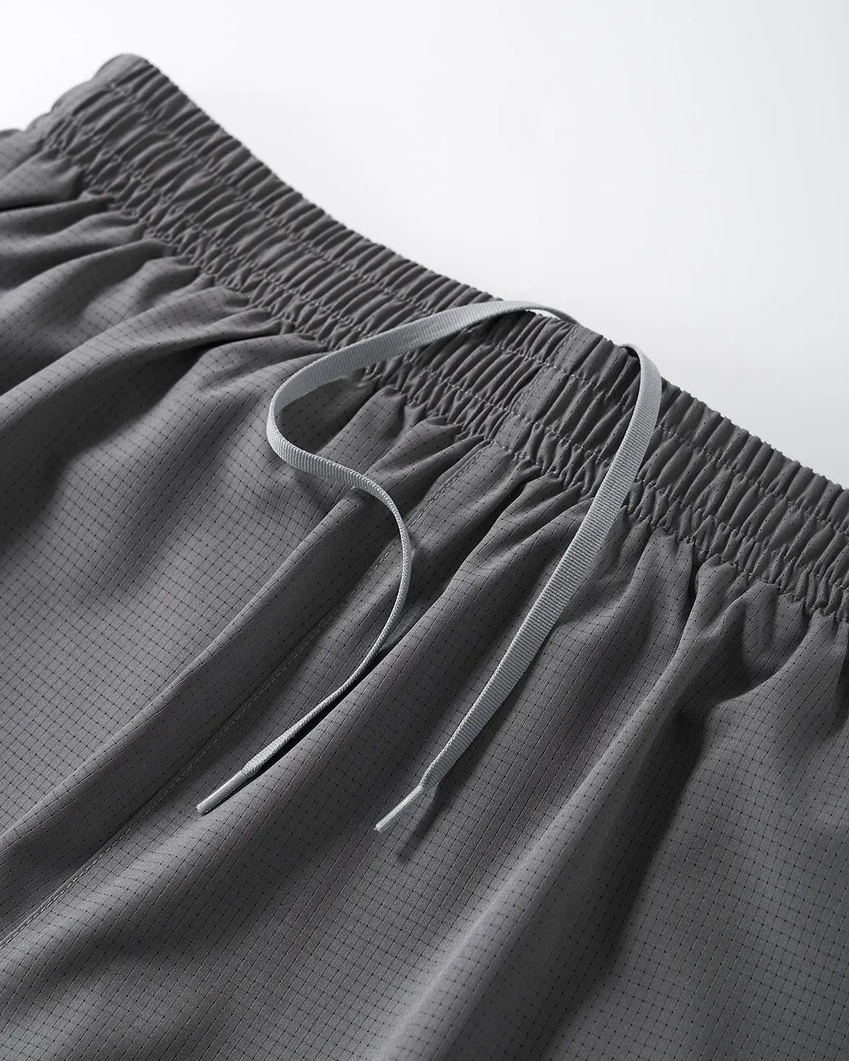 INFLATION AirFlow dual-layer breathable shorts pants with lightweight, ventilated design for comfort and airflow.