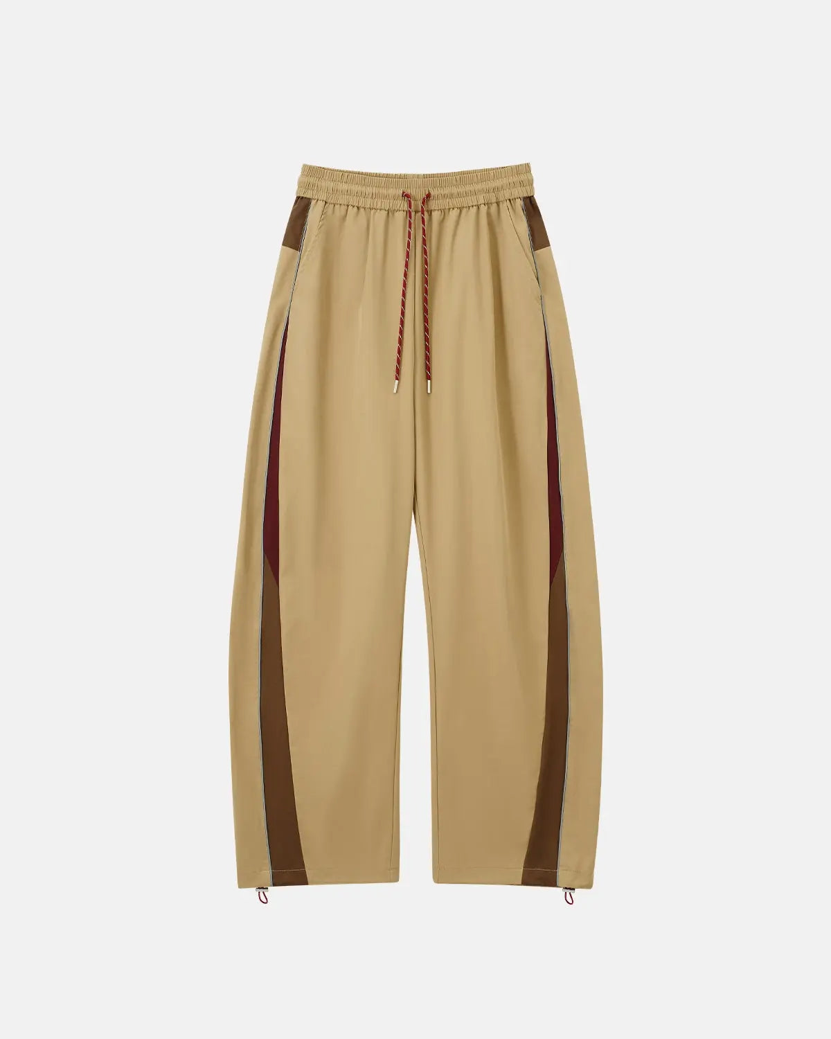 Reflective windbreaker track pants by INFLATION, featuring a sleek design with reflective accents and a comfortable fit.