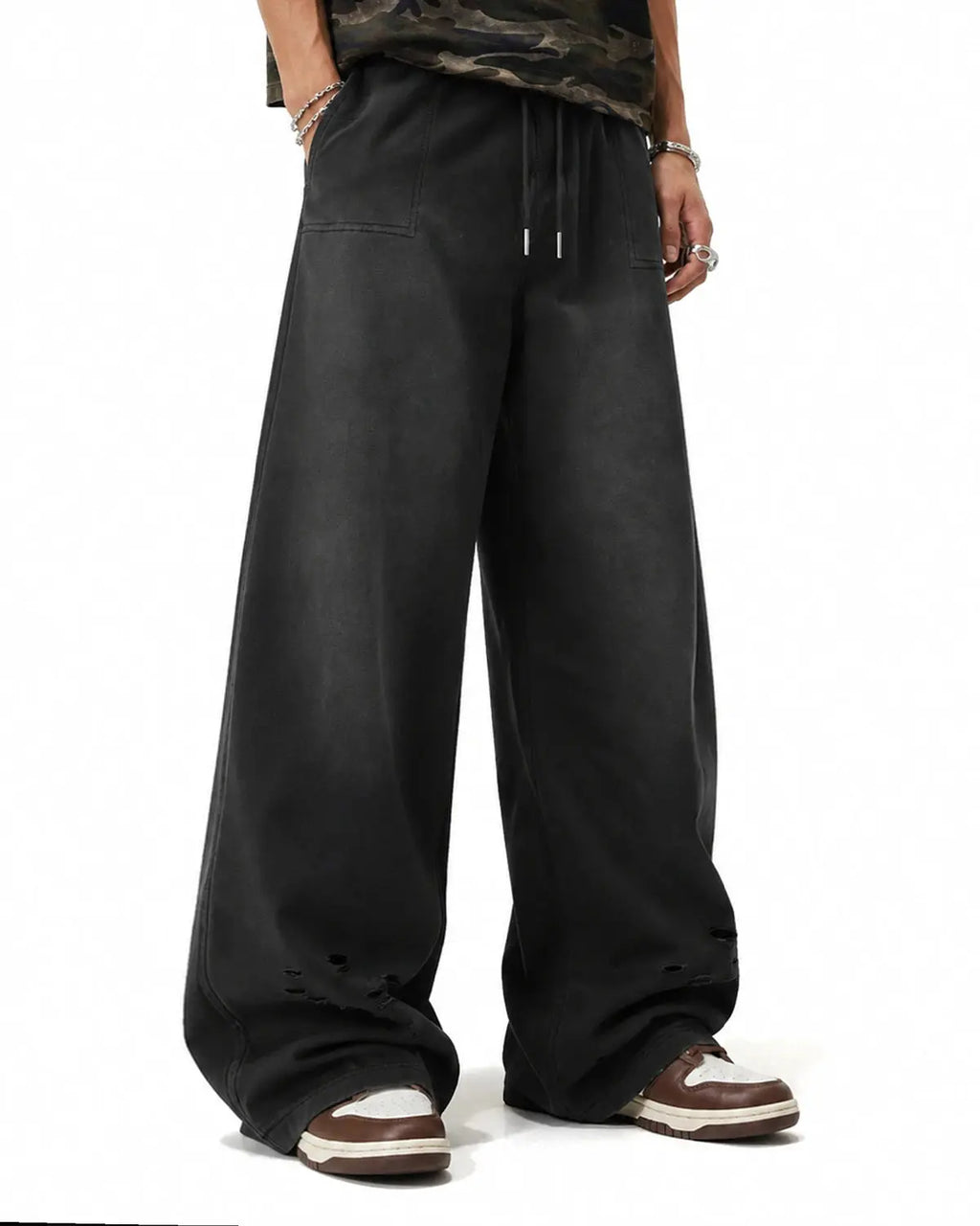 Distressed washed baggy sweatpants by INFLATION featuring a relaxed fit and stylish worn-out detail, perfect for streetwear style.