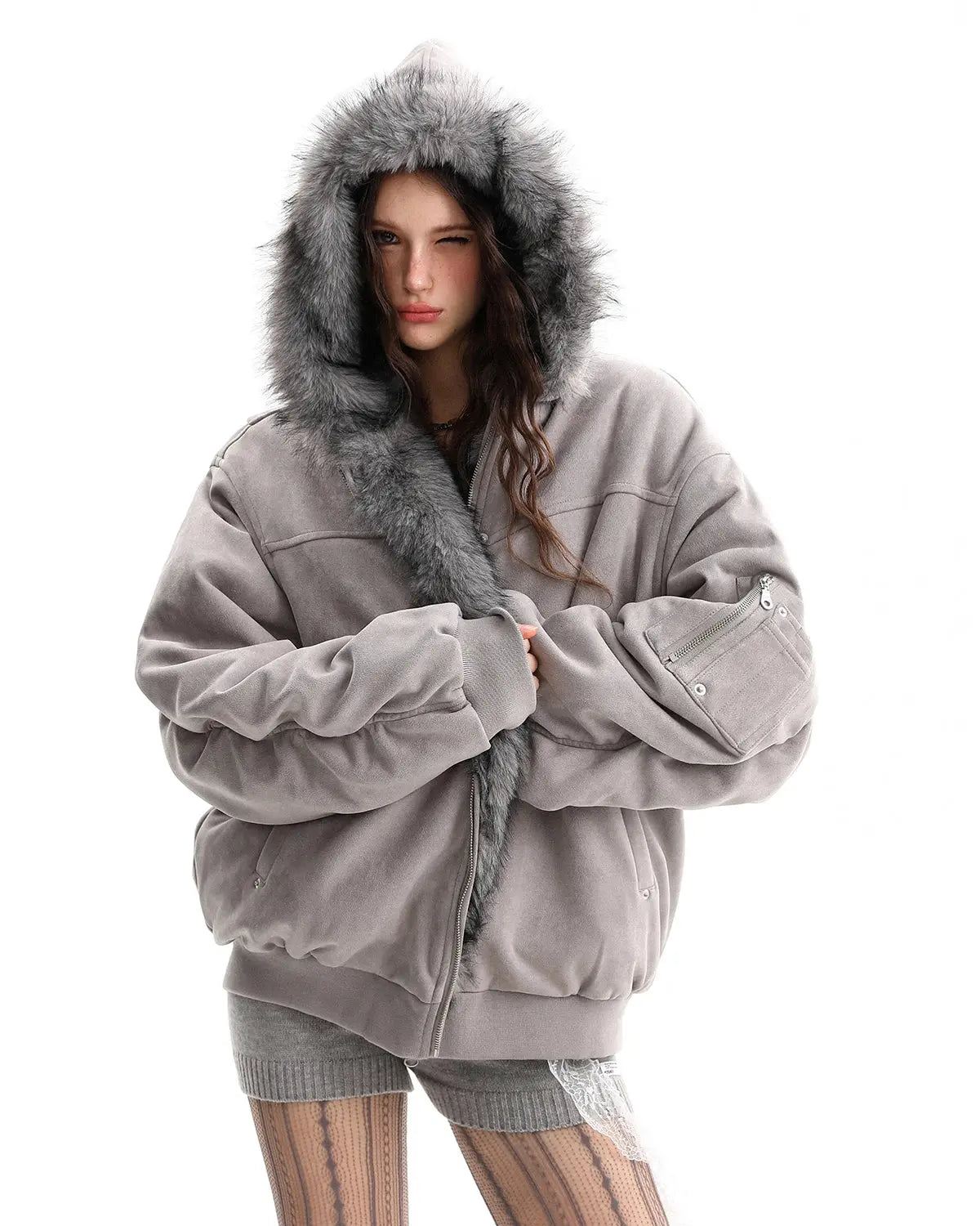 Reversible faux fur hooded jacket from INFLATION Streetwear, showcasing plush fur side and sleek outer fabric in a stylish design.