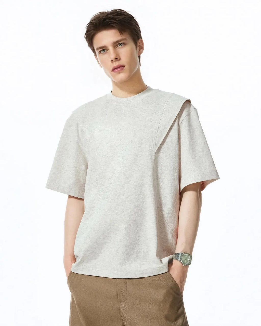 Deconstructed oversized T-shirt by INFLATION Streetwear, featuring unique cut-out design and relaxed fit, shown in neutral fabric.