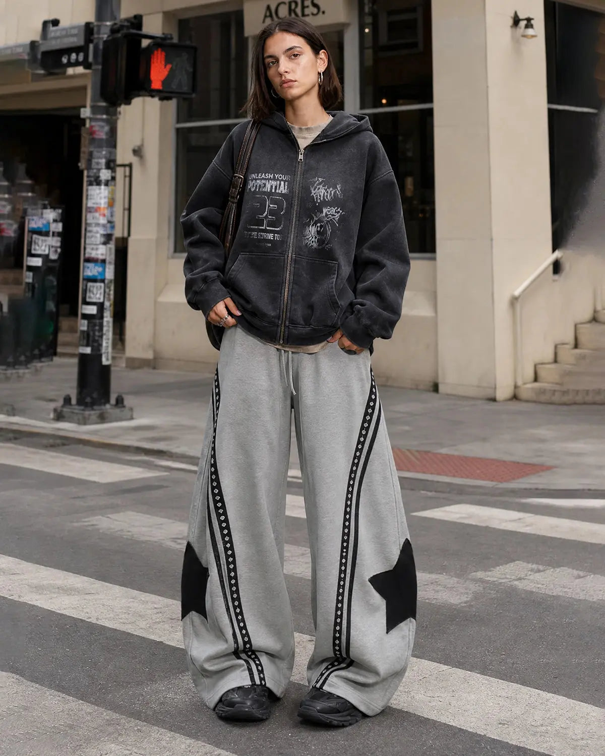 Contrast patchwork barrel sweatpants by INFLATION featuring a stylish mixed fabric design and relaxed fit.
