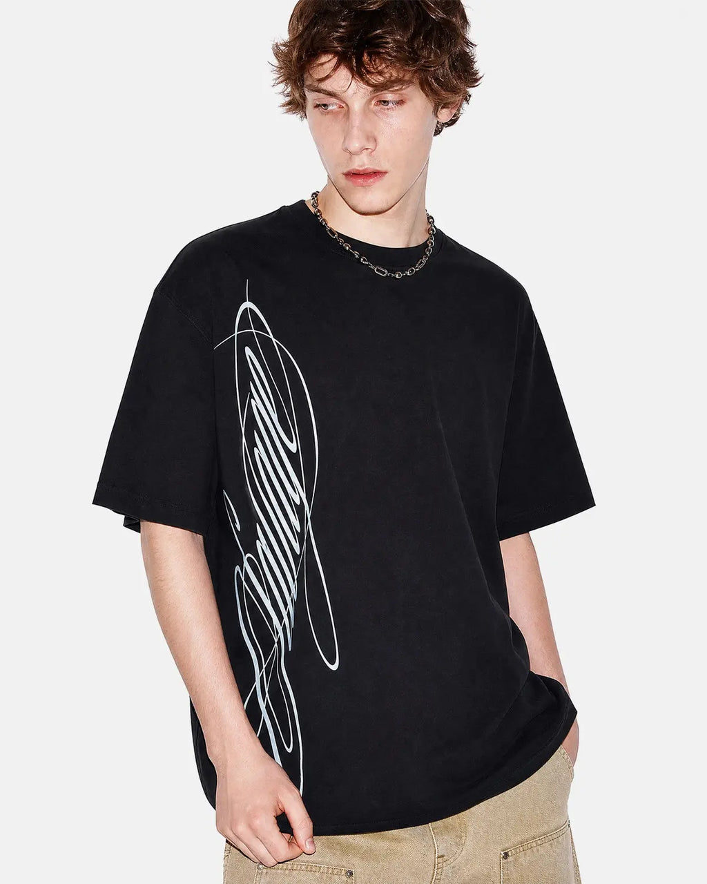 Inflation Streetwear Script Graphic Oversized T-Shirt featuring bold text and relaxed fit, made from soft cotton fabric.
