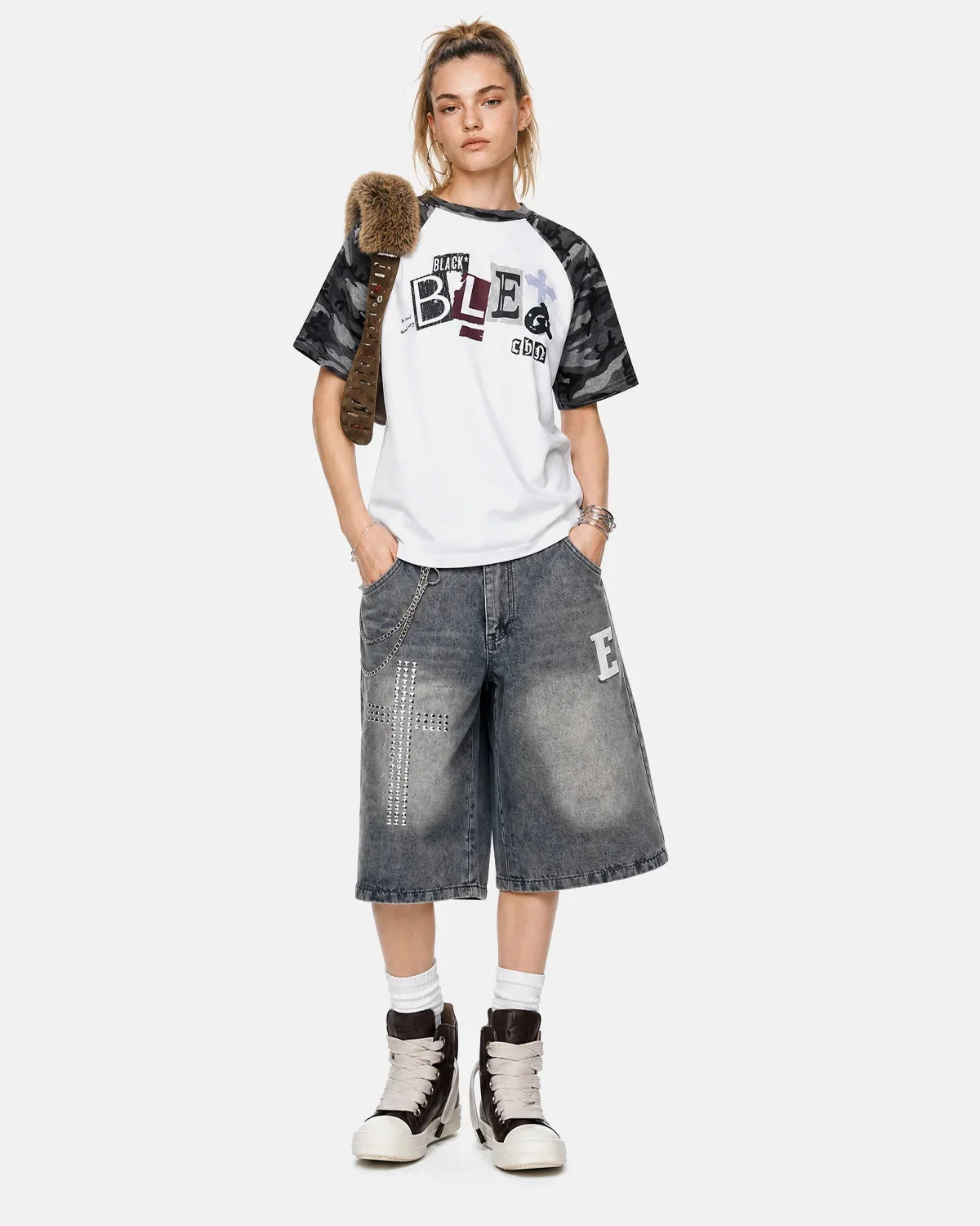 Inflation Streetwear camo sleeve graphic boxy T-shirt with bold print and relaxed fit, featuring camouflage accents on sleeves.