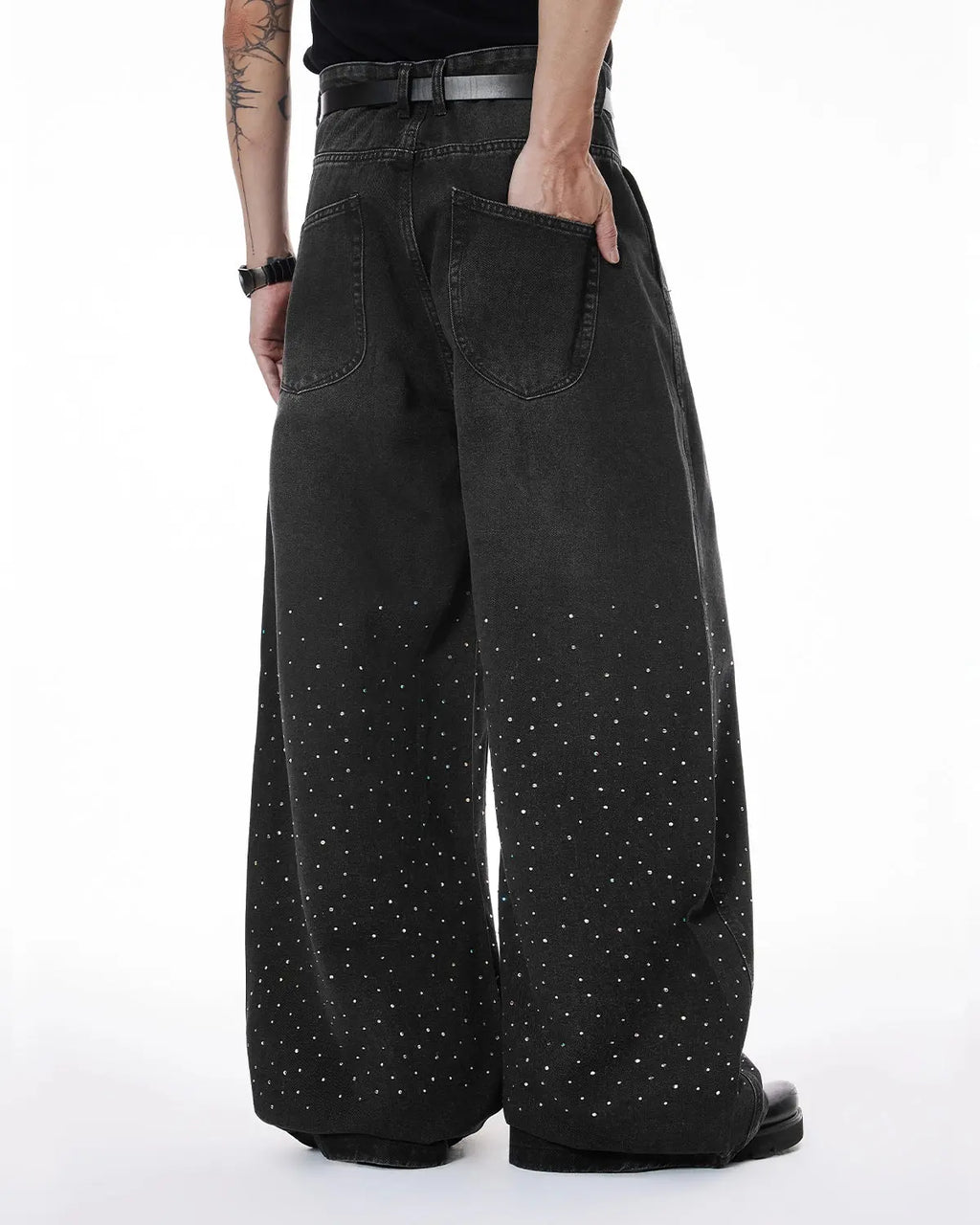 Acid washed rhinestone baggy jeans by INFLATION Streetwear featuring a relaxed fit, distressed details, and rhinestone embellishments.