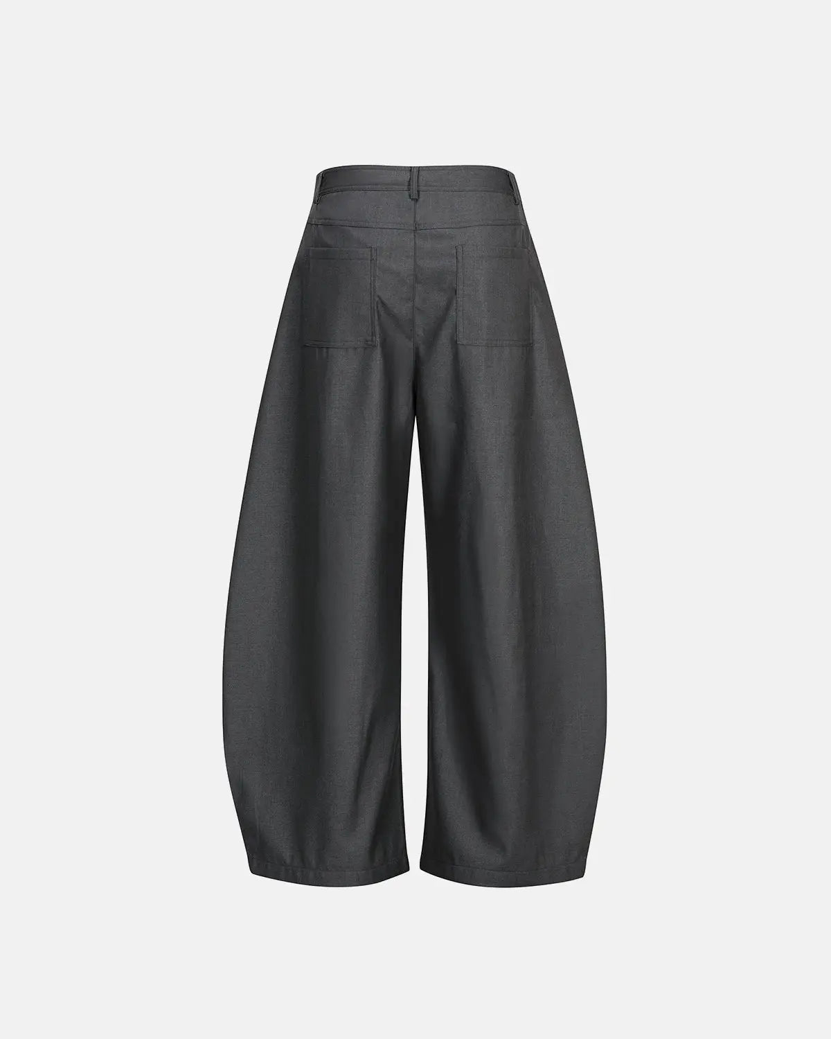 Asymmetric pleated barrel-leg suit pants by INFLATION, shown in a stylish fit with distinctive pleats and unique silhouette.