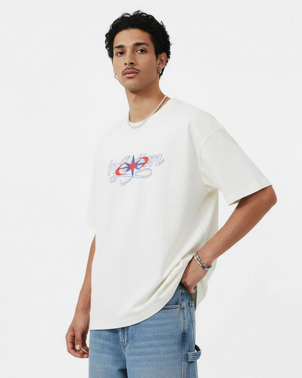 Inflation Streetwear "Money on the Way" cotton T-shirt featuring bold graphic print on a black fabric background.