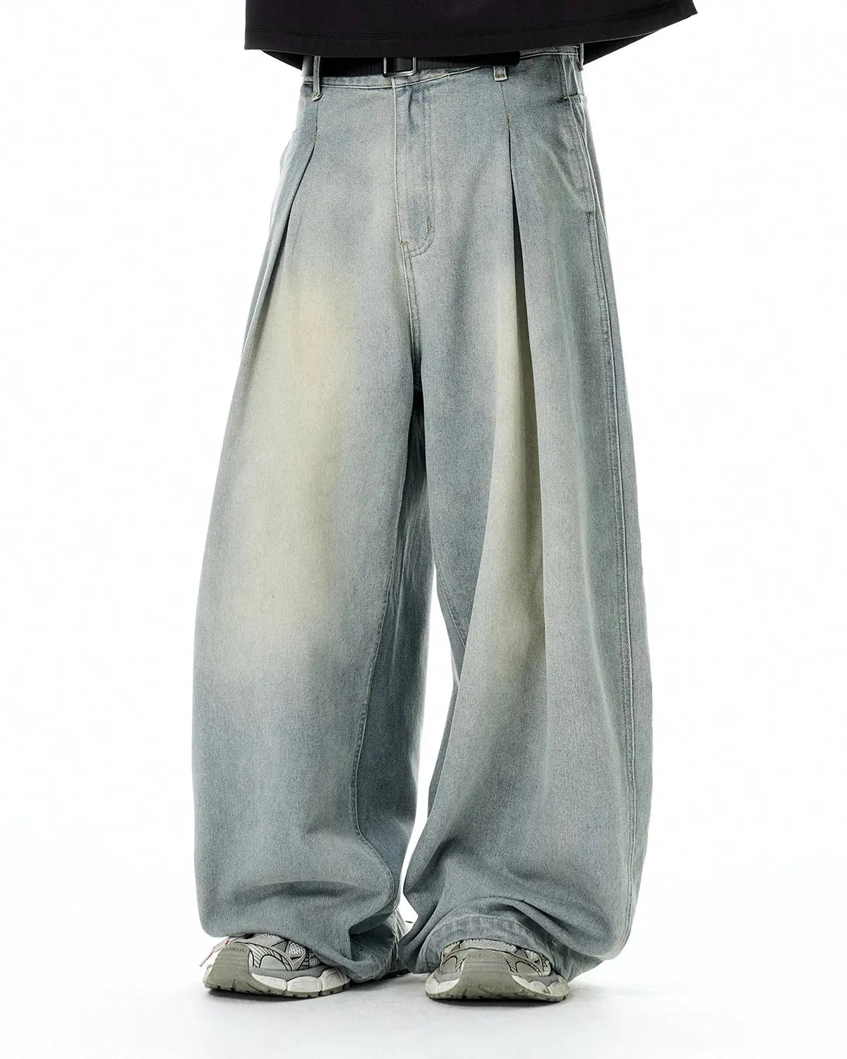 Acid washed super baggy jeans by Inflation Streetwear, showing distressed denim and relaxed fit pants with a casual style.