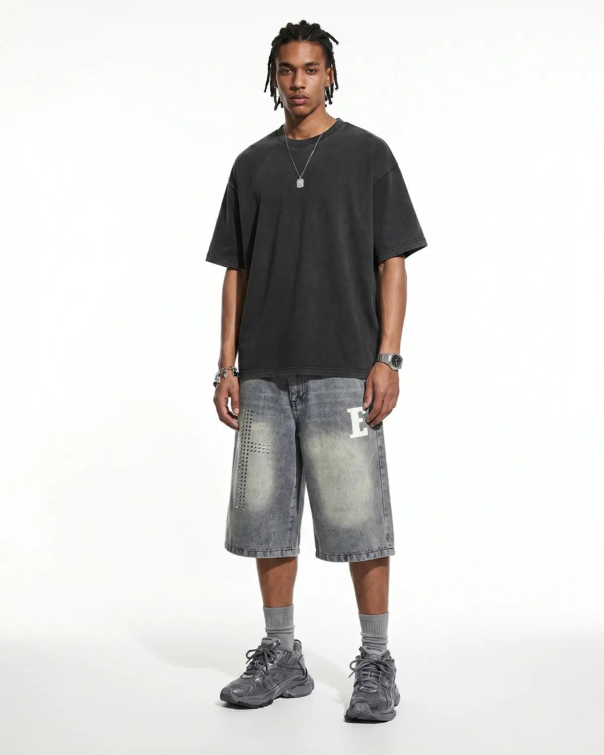 Oversized heavyweight washed T-shirt by INFLATION with a relaxed fit and vintage-style washed fabric, displayed on a neutral background.