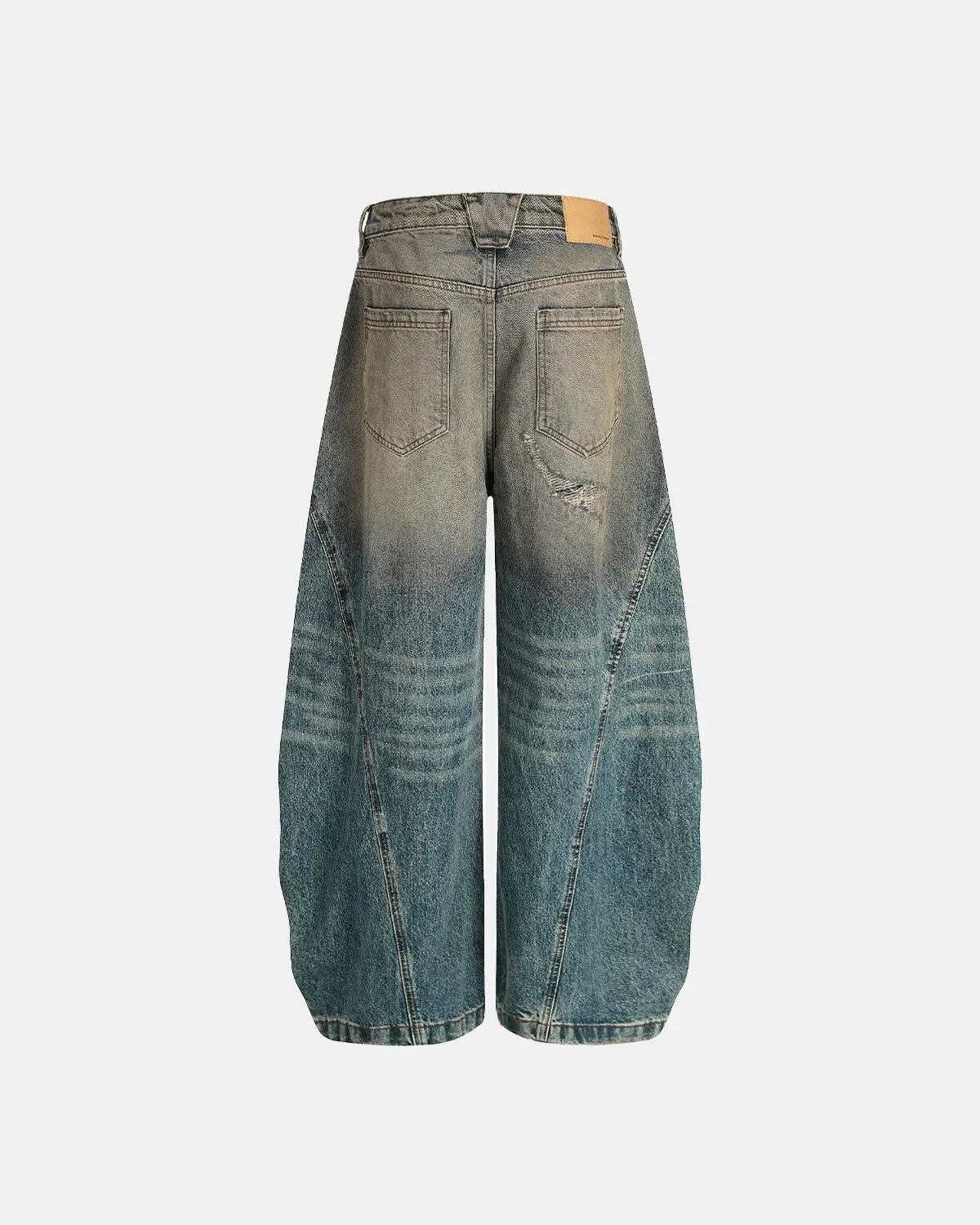 Distressed Dirty Wash Barrel Jeans by INFLATION featuring a worn, vintage look with faded and ripped details.