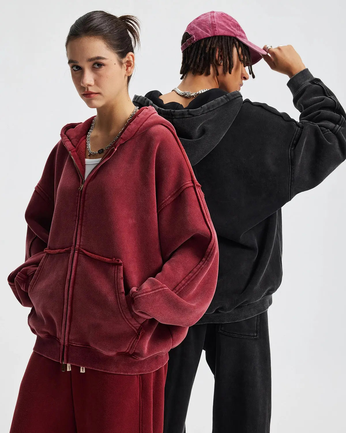 Distressed acid wash double zip hoodie by INFLATION Streetwear, showing front view with zippers and faded, rugged fabric texture.