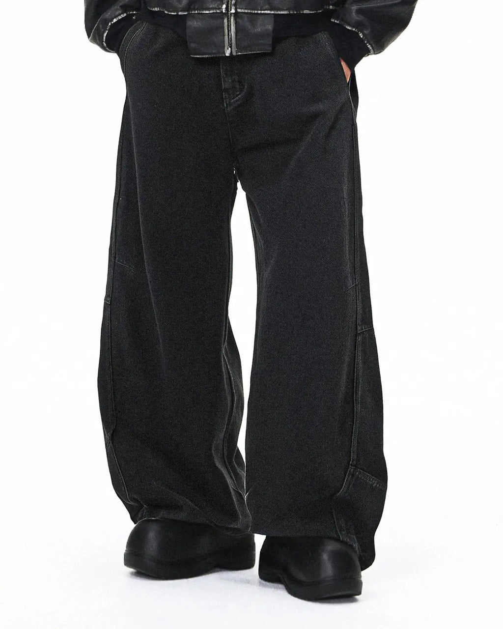 Acid washed black barrel jeans by INFLATION featuring a relaxed fit, distressed detailing, and classic five-pocket design.