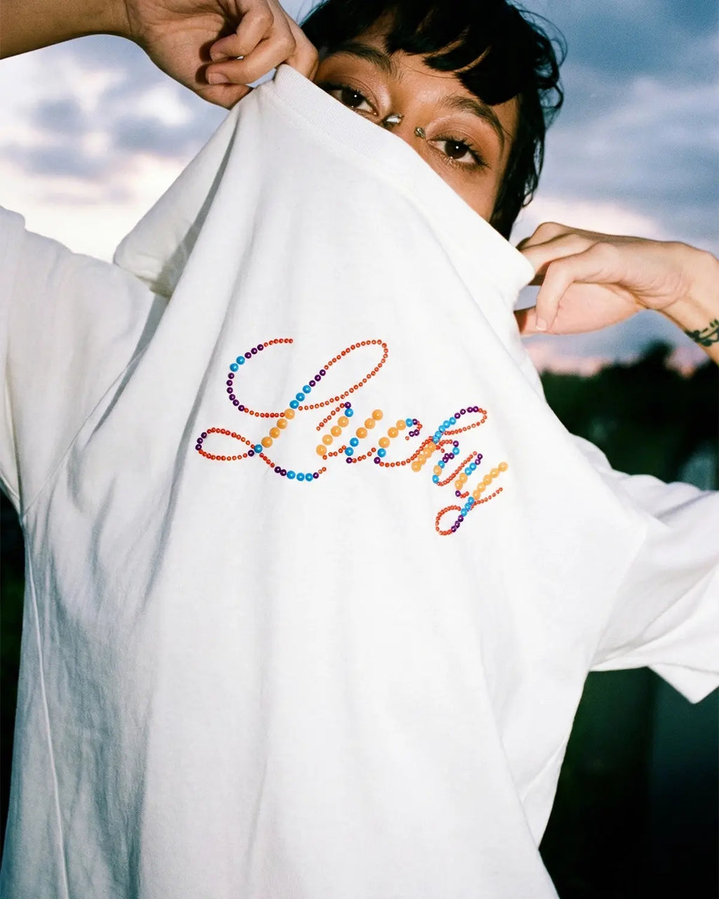 Inflation Streetwear Rhinestone Lucky graphic oversized tee featuring bold design and sparkling embellishments on soft cotton fabric.