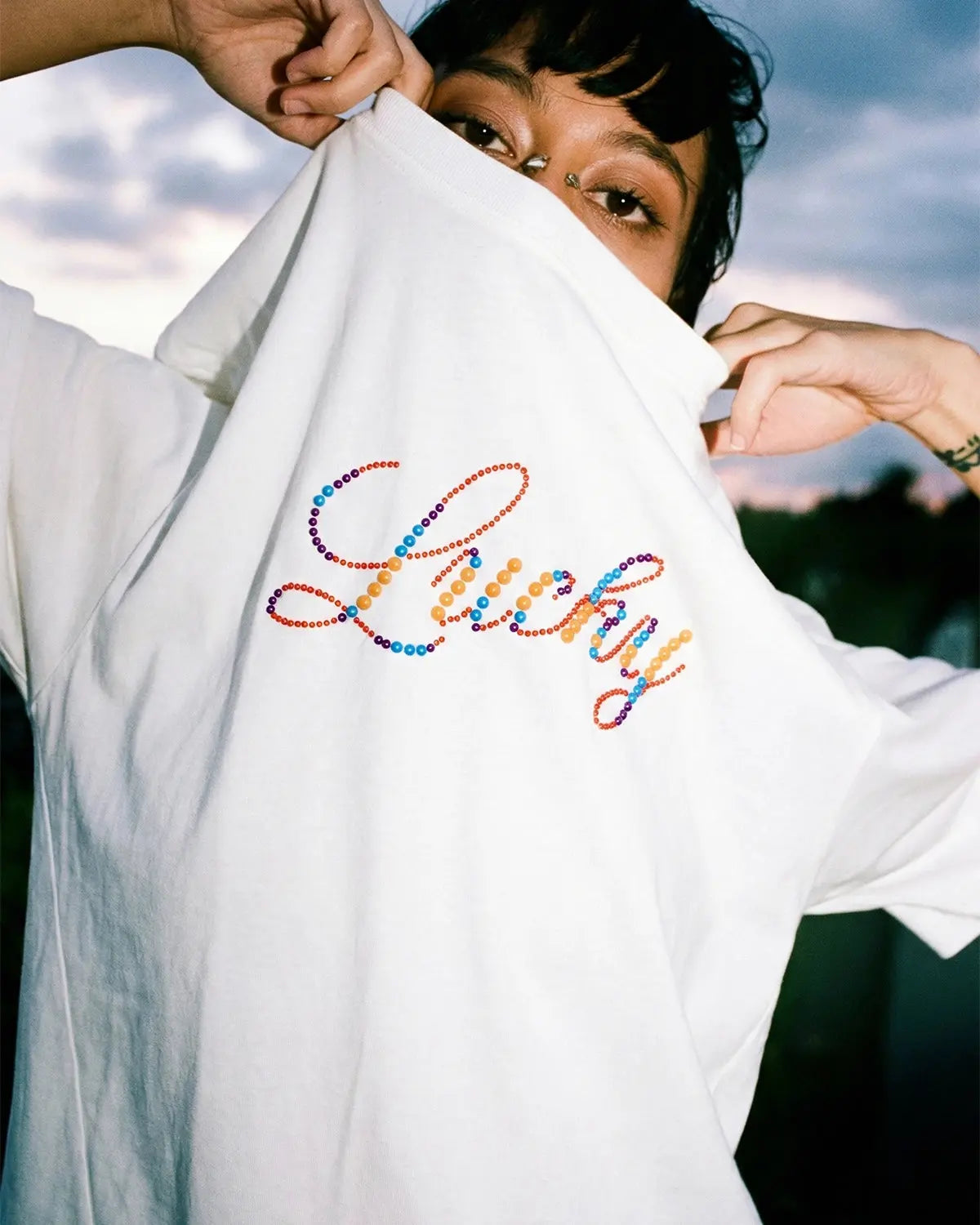 Inflation Streetwear Rhinestone Lucky graphic oversized tee featuring bold design and sparkling embellishments on soft cotton fabric.