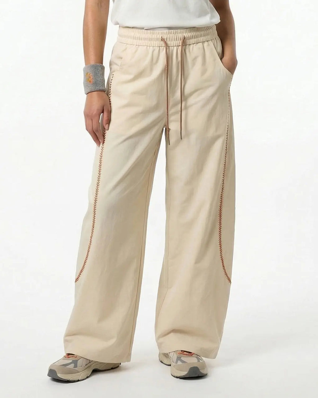 INFLATION AirFlow Contrast Embroidered Track Pants with stylish embroidery and breathable fabric, shown in a relaxed fit.