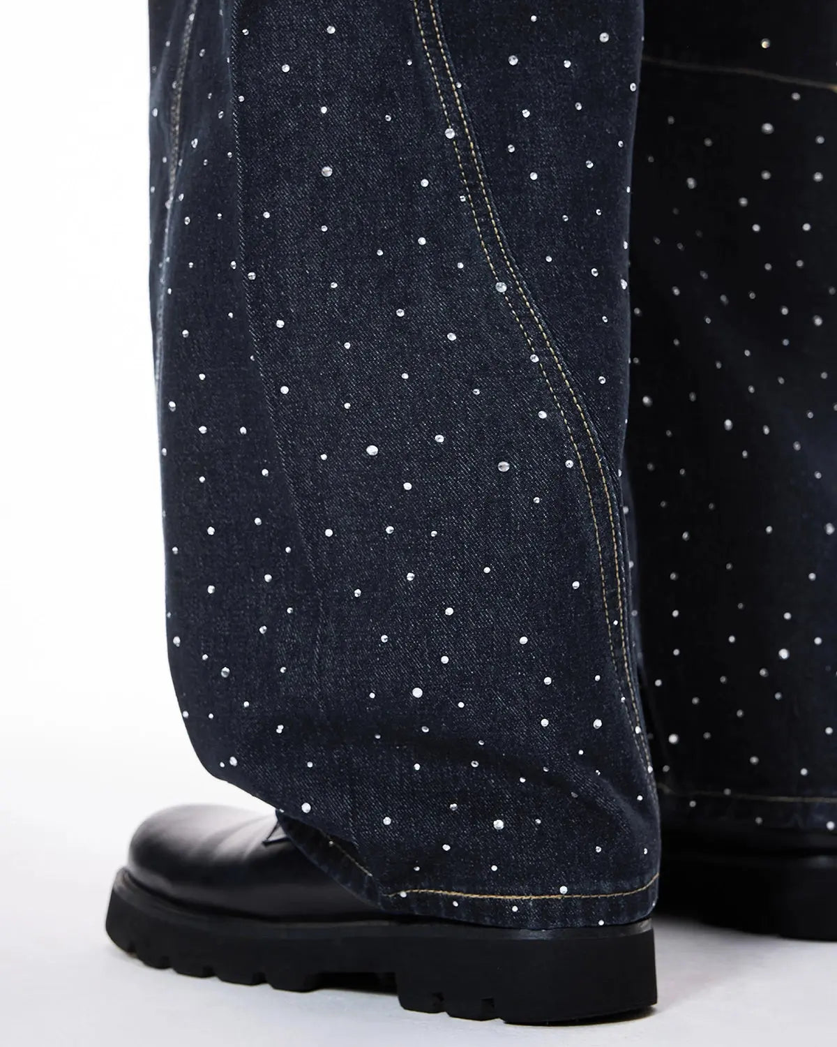 Leopard patch rhinestone barrel jeans by INFLATION featuring distressed denim and embellishments, styled with a casual streetwear look.