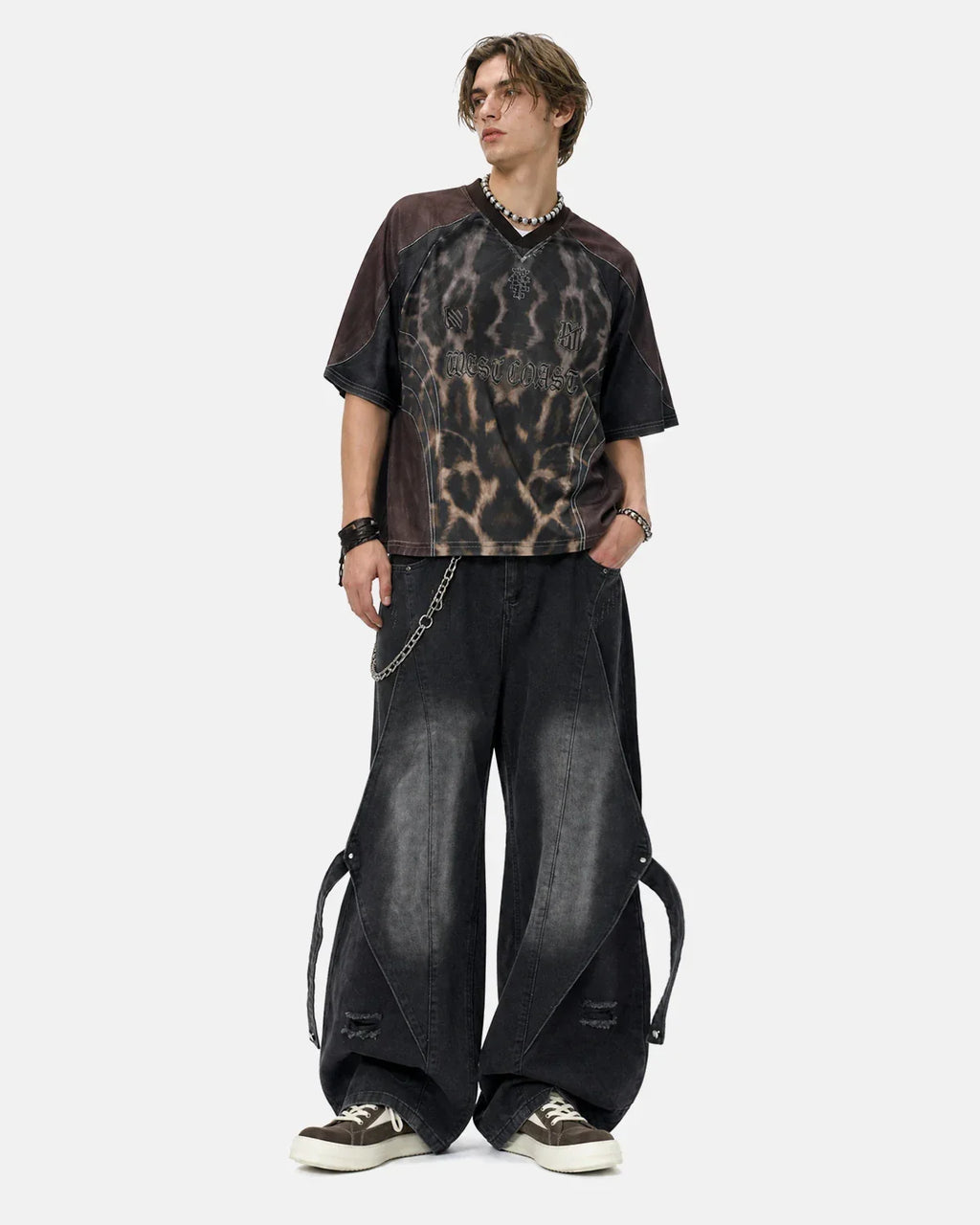 Light blue adjustable strap washed straight-leg jeans by INFLATION, featuring a relaxed fit and classic denim texture.