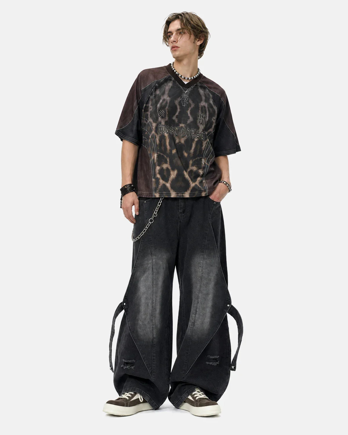 Light blue adjustable strap washed straight-leg jeans by INFLATION, featuring a relaxed fit and classic denim texture.