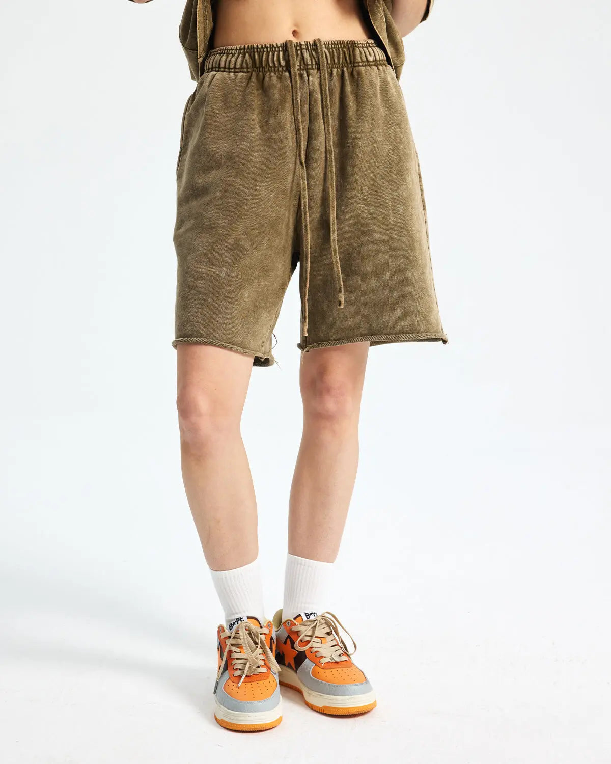 Inflation heavyweight washed sweat shorts, casual streetwear pants in soft, faded fabric with relaxed fit and elastic waistband.