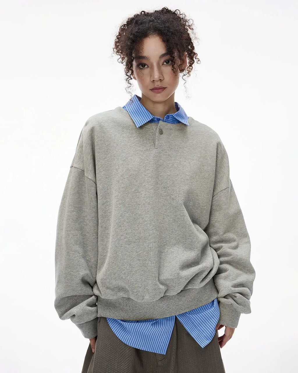 Boxy fit Henley collar sweatshirt by INFLATION Streetwear, featuring a relaxed fit with a buttoned Henley neckline and casual style.
